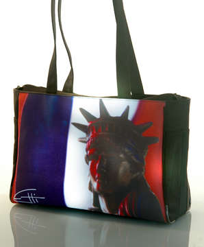 Ms. Liberty-Red.White & Blue
Tote Bag : Two elastic side bottle pockets, interior zipper pocket, zipper closure, water & stain resistant interior. 15.5" x 11" x 5 " at base. 1" x 24" handles