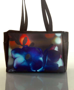 "Blue Freesias"
Tote Bag : Two elastic side bottle pockets, interior zipper pocket, zipper closure, water & stain resistant interior. 15.5" x 11" x 5 " at base. 1" x 24" handles