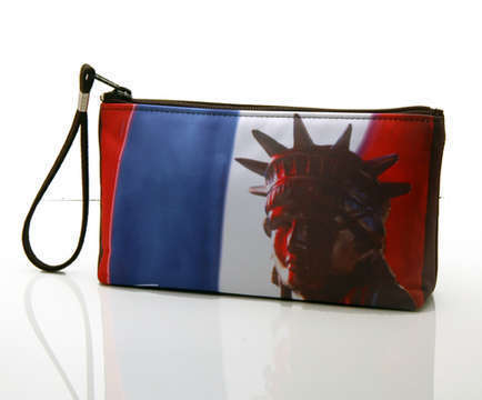 "Ms. Liberty Red, White & Blue"
Cosmetic/clutch bag with zipper closure, interior attached key fob   10" x 5.5" x 1.75"- at base 6.5" 