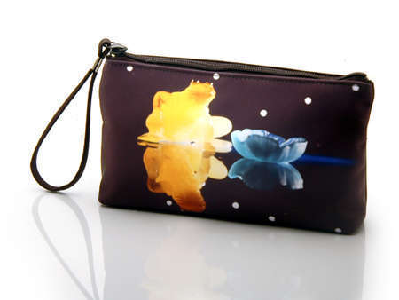 "Prince Charming"
Cosmetic/clutch bag with zipper closure, interior attached key fob   10" x 5.5" x 1.75"- at base 6.5" 