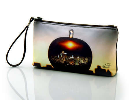 "The Big Apple"
Cosmetic/clutch bag with zipper closure, interior attached key fob   10" x 5.5" x 1.75"- at base 6.5" 