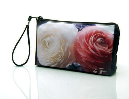 "White & Pink"
Cosmetic/clutch bag with zipper closure, interior attached key fob   10" x 5.5" x 1.75"- at base 6.5" 