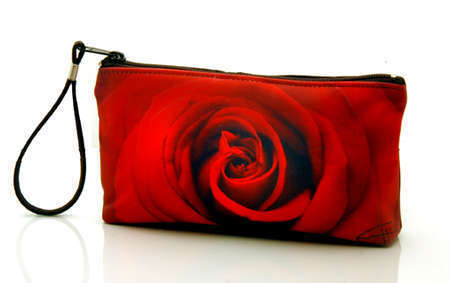 "Red Velvet"
Cosmetic/clutch bag with zipper closure, interior attached key fob   10" x 5.5" x 1.75"- at base 6.5" 